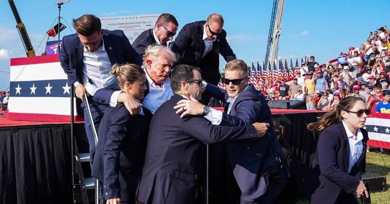 BREAKING: Trump rushed off stage as gunshots fired at campaign rally